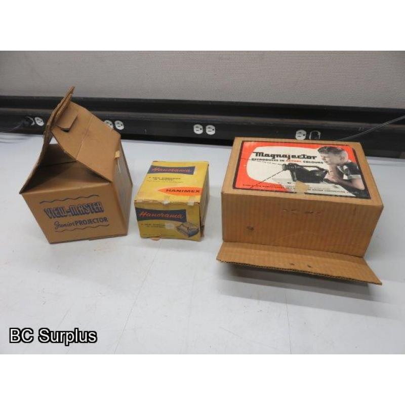 Q-168: Vintage Projectors in Original Boxes – 3 Items